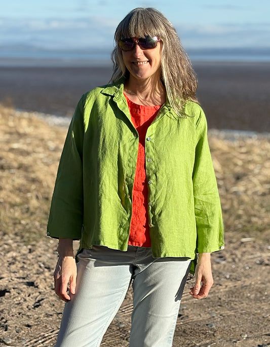 green linen shirt with high low hemline