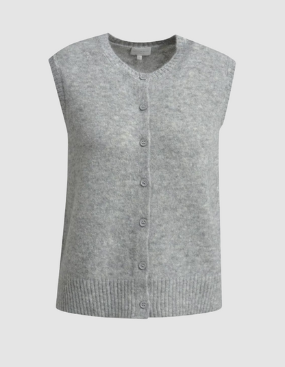 Gray knitted vest with buttons on a light gray background