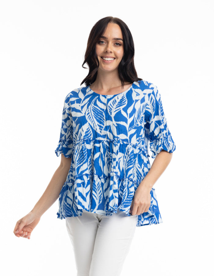 blue and white cotton tiered top with 3/4 length sleeves