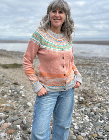 woman wearing peach fair isle cardigan