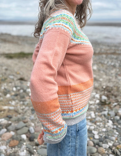 woman wearing peach fair isle cardigan