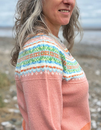 woman wearing peach fair isle cardigan