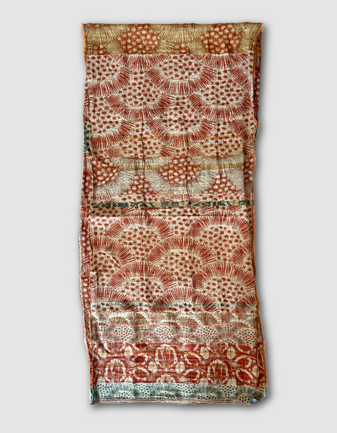 Patterned jacquard organic cotton scarf with star designs in terracotta, green and cream