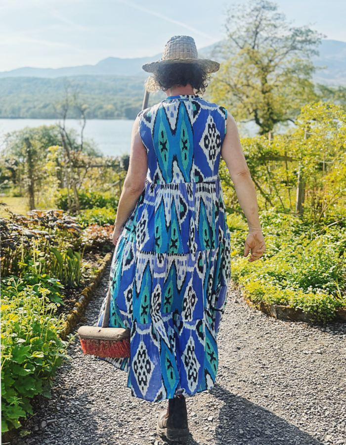 tiered maxi length sleeveless cotton summer dress with blue turquoise and black Ikat print