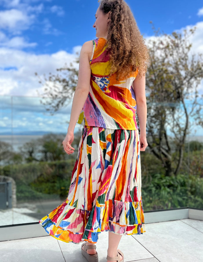 midi length flared cotton skirt with deep waistband so it can be worn as a dress, bright abstract print