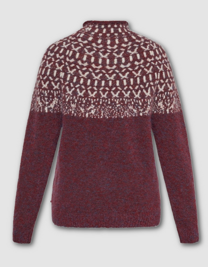 Maroon and white patterned sweater on a light gray background