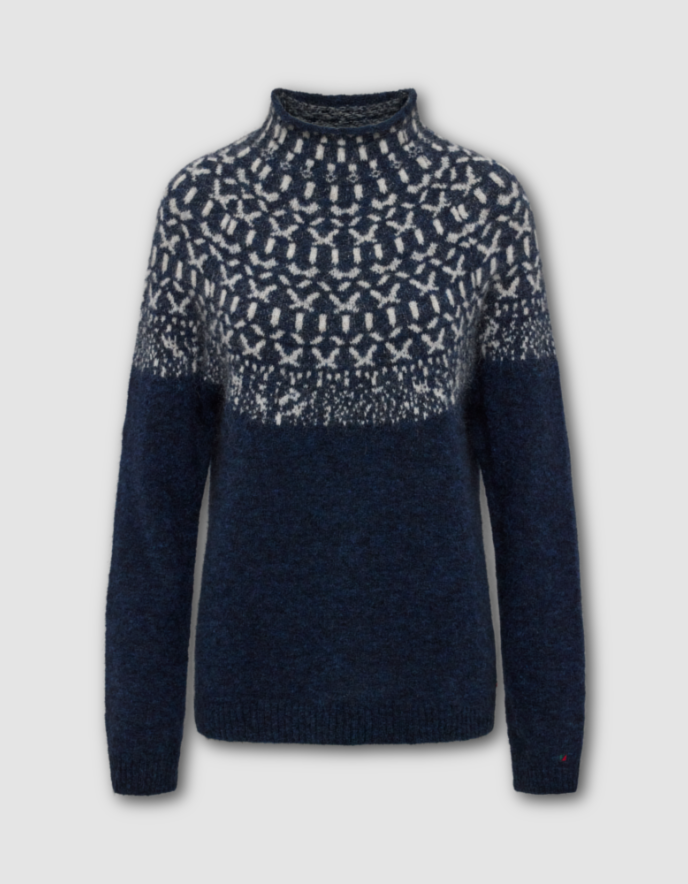 Navy blue sweater with white pattern on a light gray background