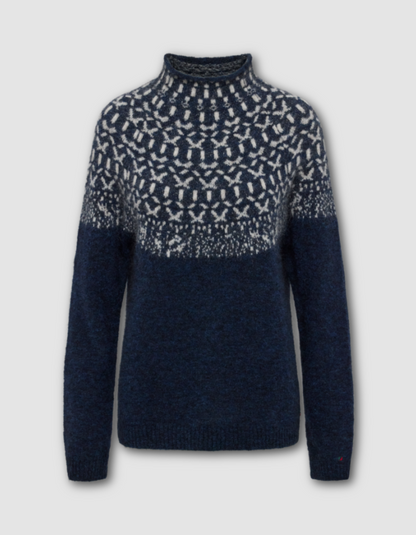Navy blue sweater with white pattern on a light gray background