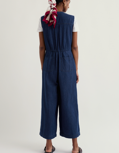 woman wearing a denim wide leg jumpsuit