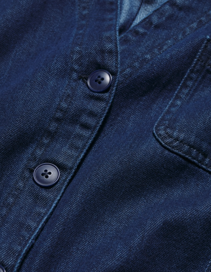 woman wearing a denim wide leg jumpsuit