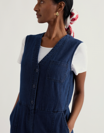 woman wearing a denim wide leg jumpsuit