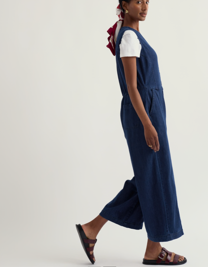 woman wearing a denim wide leg jumpsuit