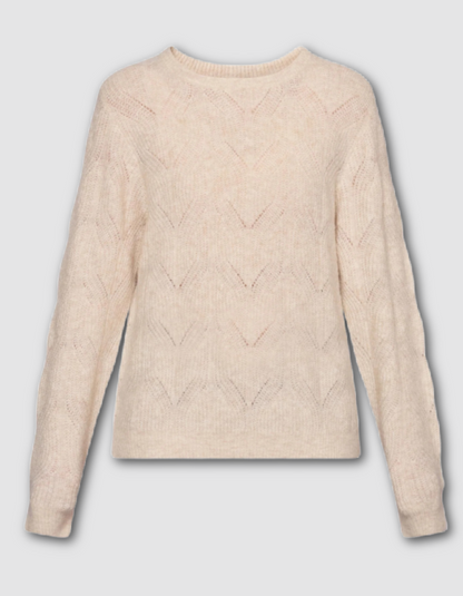 Beige cable knit sweater on a light gray background