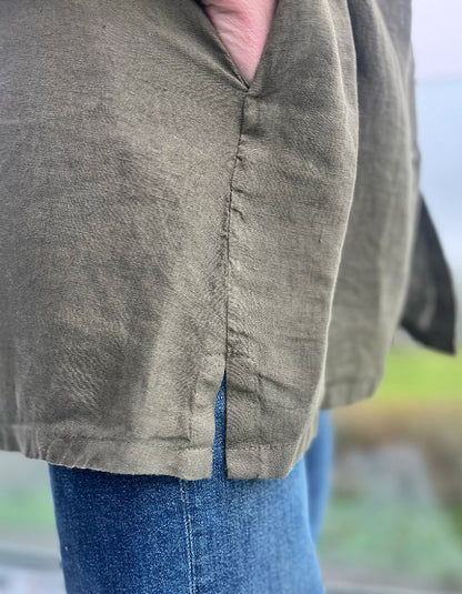 khaki linen duster shirt with A line shape and pockets