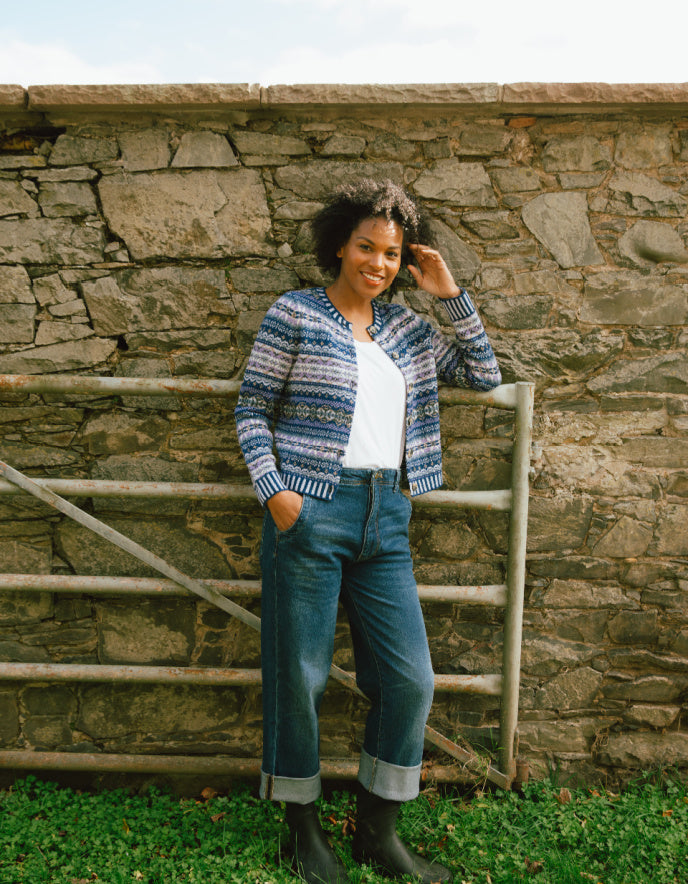 woman wearing blue fair isle cardigan