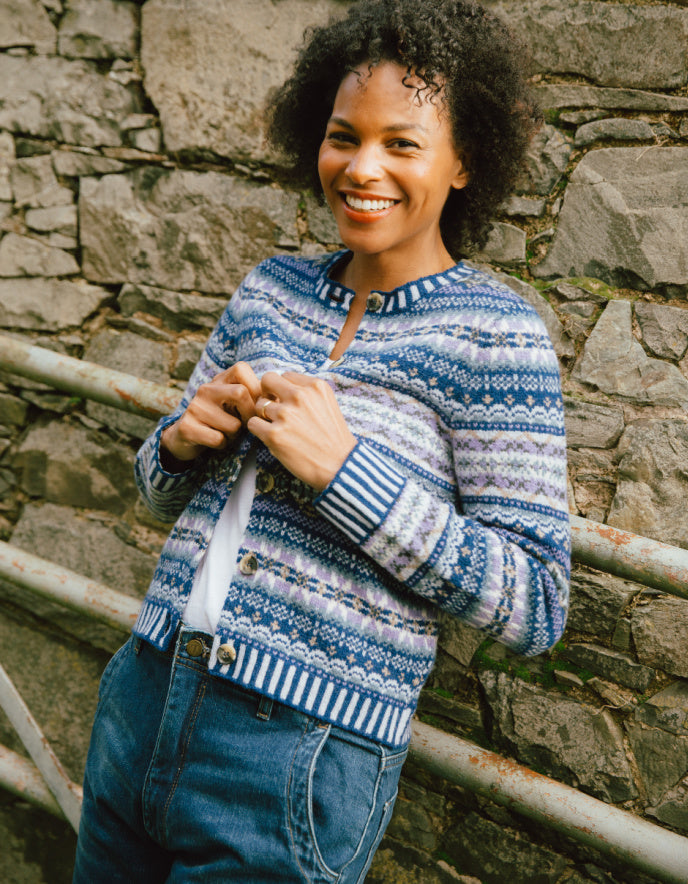 woman wearing blue fair isle cardigan