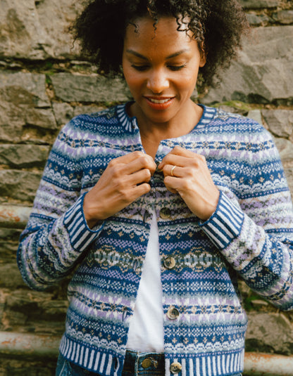 woman wearing blue fair isle cardigan