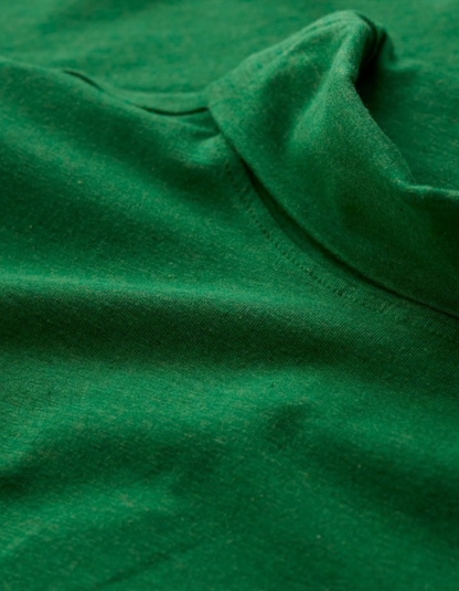 Close-up of green fabric with folds