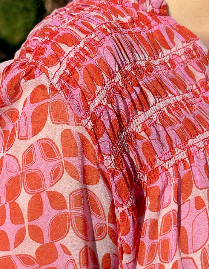 pink geo print shirred blouse