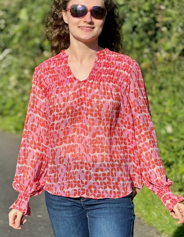 pink geo print shirred blouse