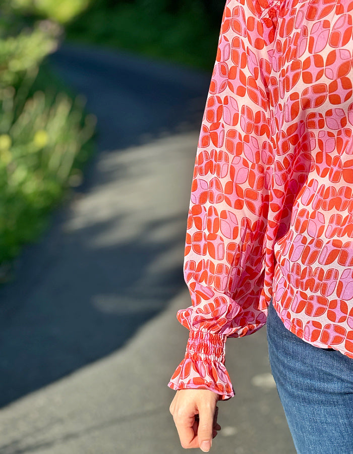 pink geo print shirred blouse