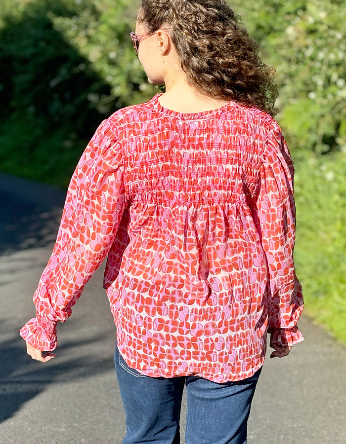 pink geo print shirred blouse