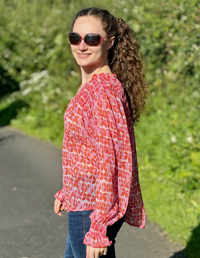 pink geo print shirred blouse