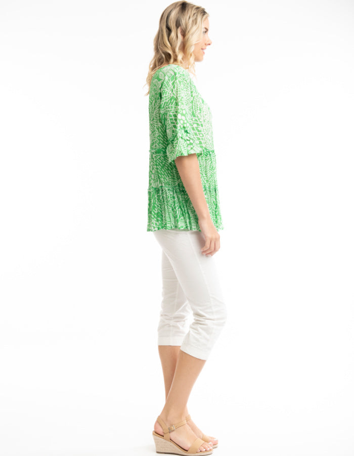 green and white print cotton summer top with 3/4 sleeves and tiered frills A-line shape