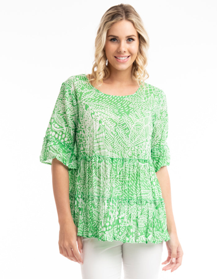 green and white print cotton summer top with 3/4 sleeves and tiered frills A-line shape