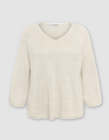 Beige sweater on a light gray background