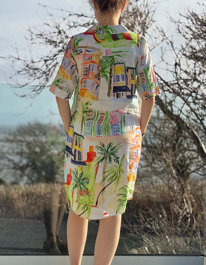 white linen shirt dress with colourful sketch print of tropical Palm trees