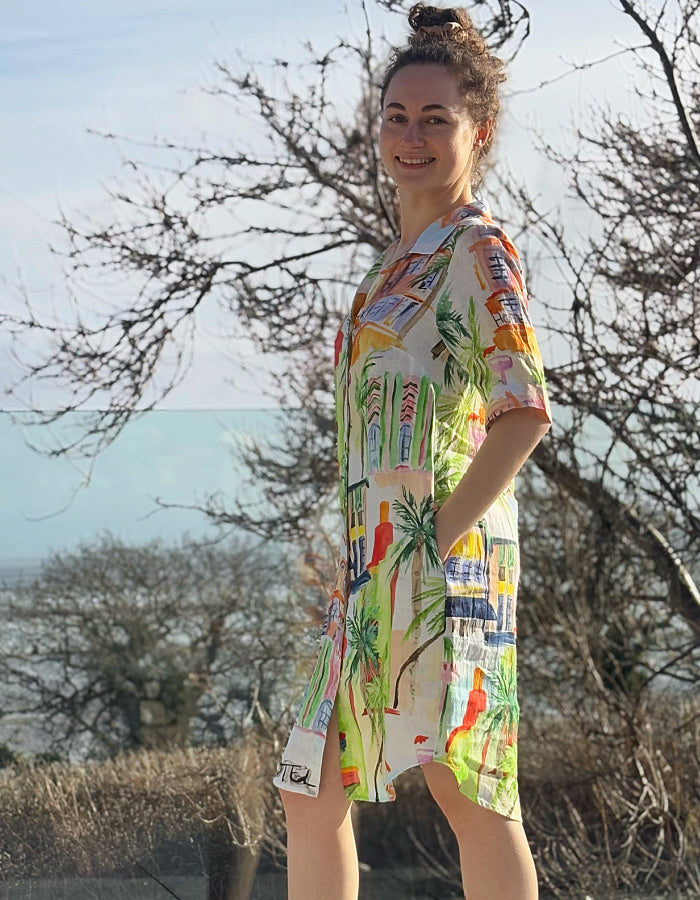 white linen shirt dress with colourful sketch print of tropical Palm trees