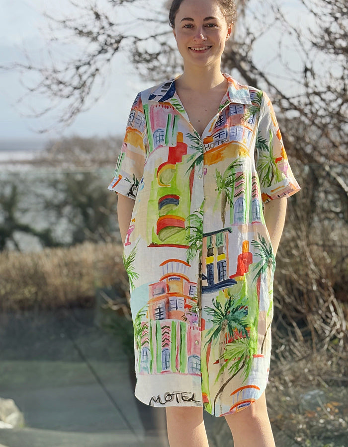 white linen shirt dress with colourful sketch print of tropical Palm trees