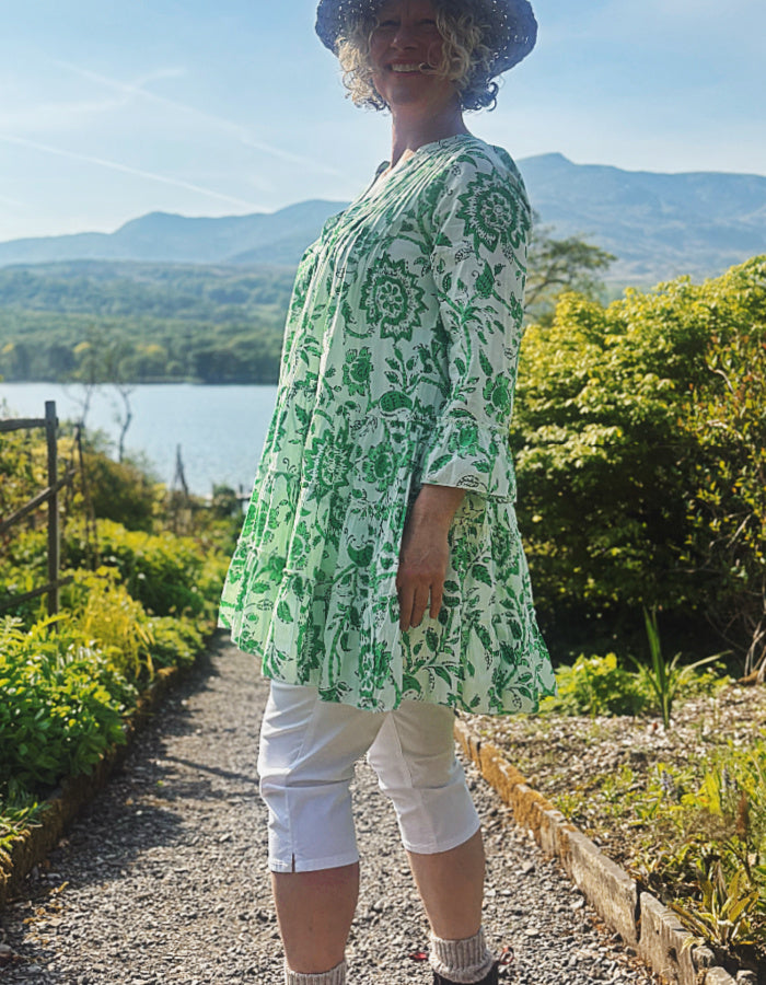 short flared summer dress in green and white floral cotton, perfect over capris or leggings or over a swimsuit