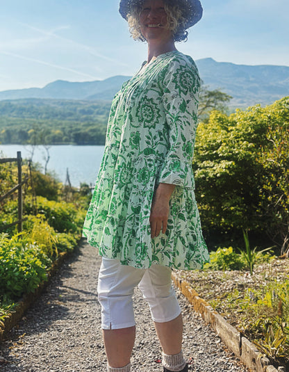 short flared summer dress in green and white floral cotton, perfect over capris or leggings or over a swimsuit