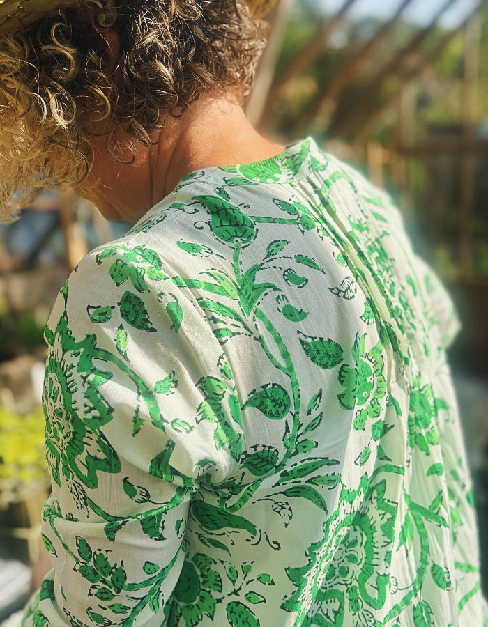 short flared summer dress in green and white floral cotton, perfect over capris or leggings or over a swimsuit