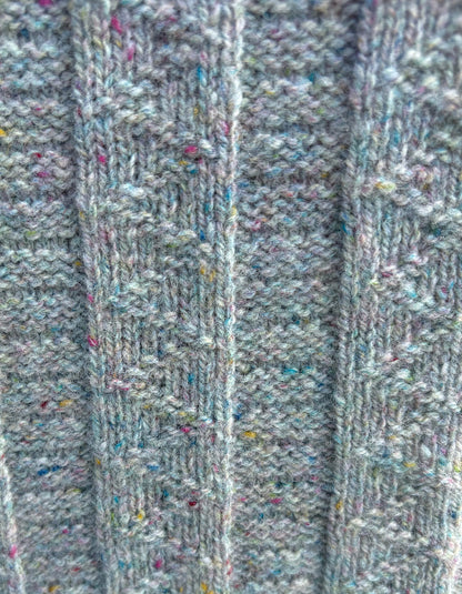 Close-up of textured fabric with a ribbed pattern