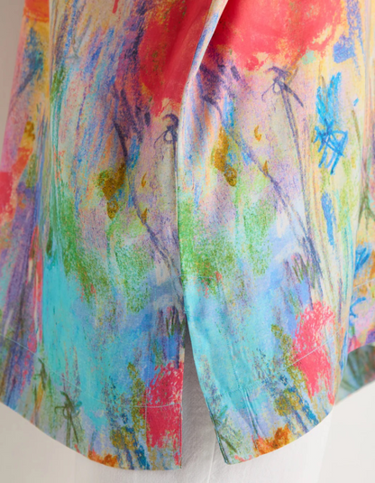 woman wearing floral print boxy tunic top