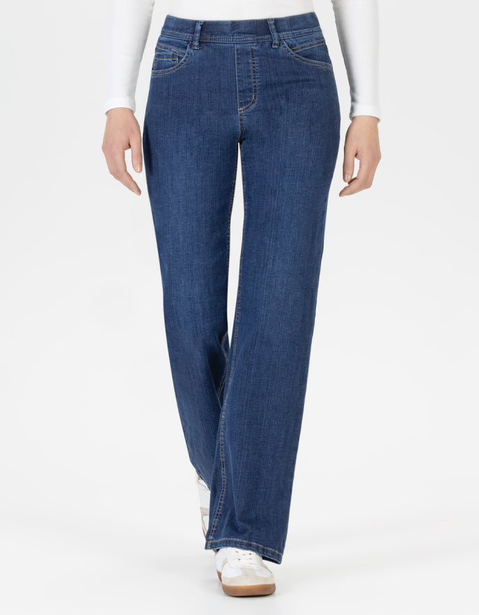 Blue straight leg jeans with elasticated waist worn by a person on a white background