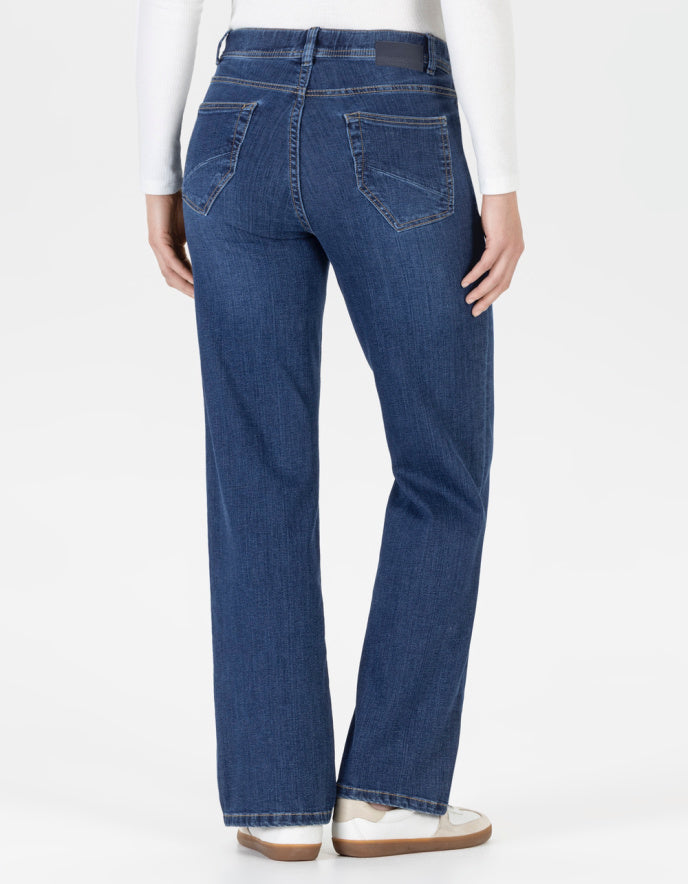 Blue straight leg jeans with elasticated waist worn by a person on a white background