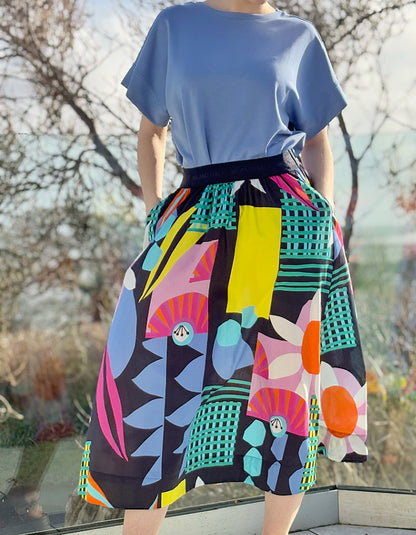 cotton circle skirt in bright graphic floral print and pocket, elasticated waistband