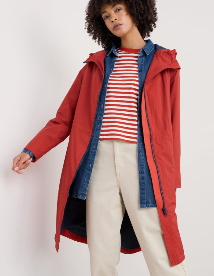 lightweight red packable midi length raincoat with a hood