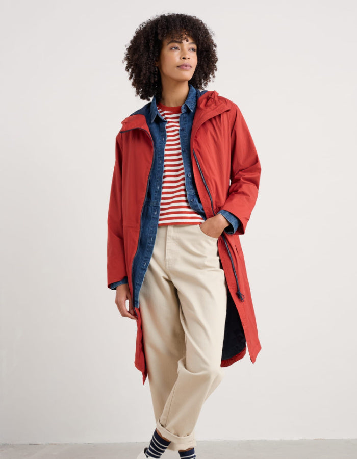 lightweight red packable midi length raincoat with a hood