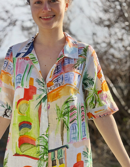 white linen shirt dress with colourful sketch print of tropical Palm trees