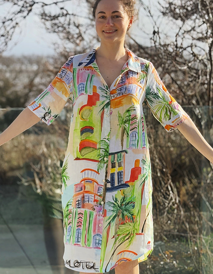 white linen shirt dress with colourful sketch print of tropical Palm trees