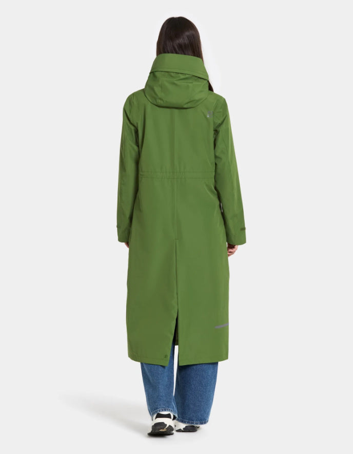 woman wearing midi length green raincoat