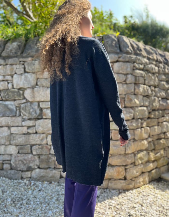 fine merino long cardigan that can be worn loose with v neckline or wrapped to the side for a more fitted look