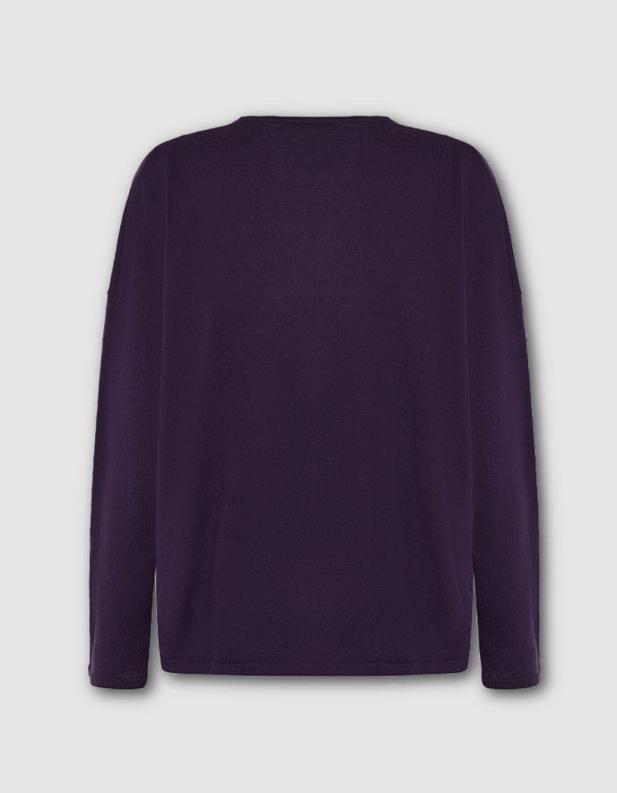 Purple long-sleeve shirt on a light gray background