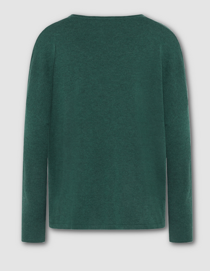 Green long-sleeve shirt on a light gray background