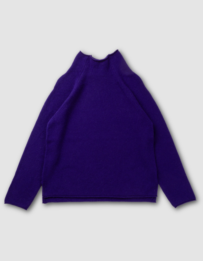 dark purple lambswool,long sweater with raglan sleeves and mock turtle neck. made in Scotland